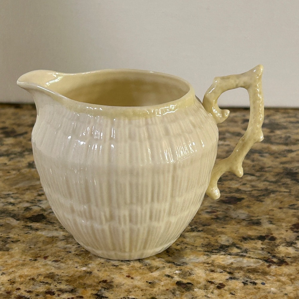 Belleek Neptune Creamer 3.25in Ivory‎ Yellow Shell Pattern Coral Handle Vintage